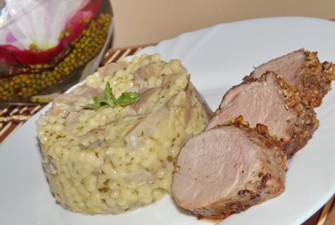 Muschiulet de porc in crusta de nuci si migdale cu garnitura de cus-cus