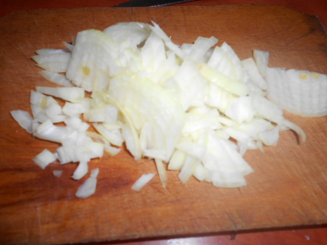 Muschi de porc pe pat de ceapa